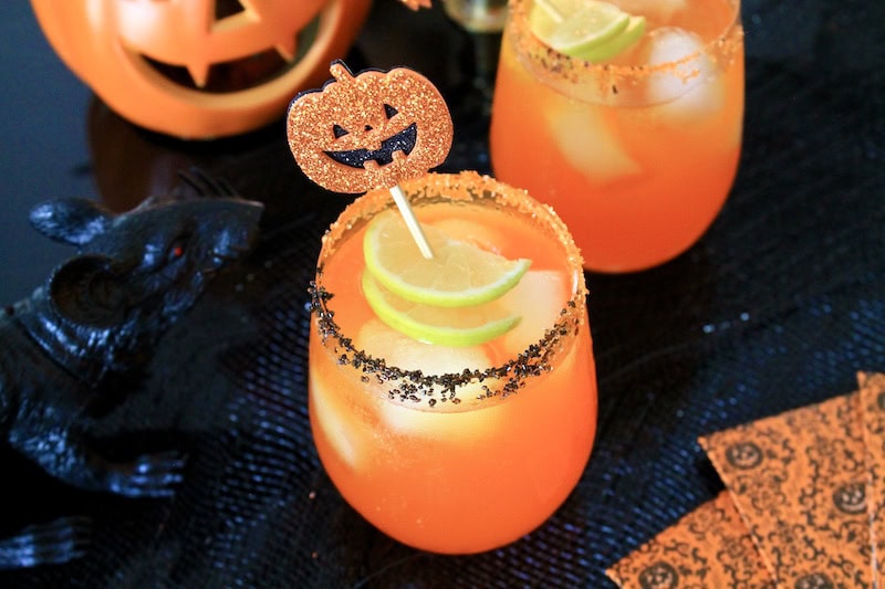 halloween vodka drinks with orange juice and orange soda