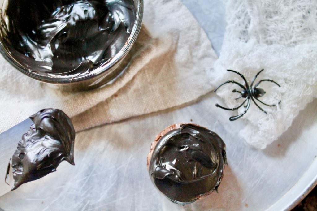 frosting the spider bite brownies