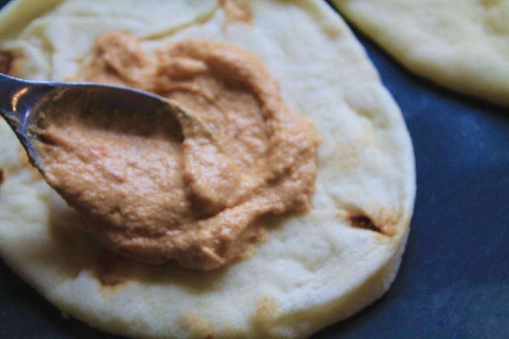 hummus spread with naan bread
