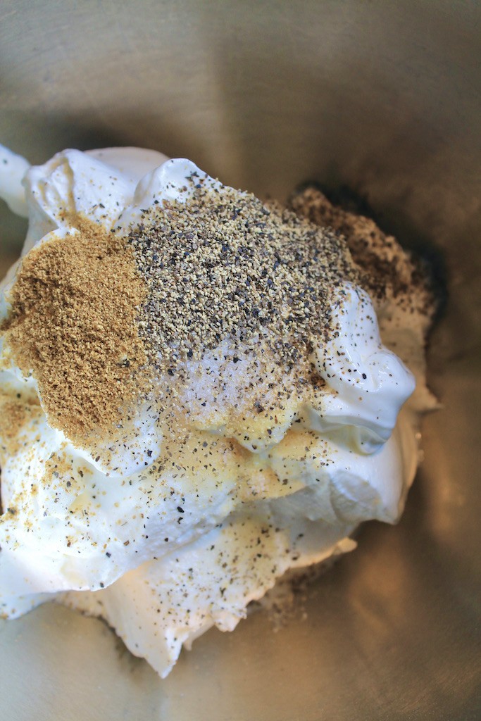 add spices to flavor spicy creamy sour cream dip