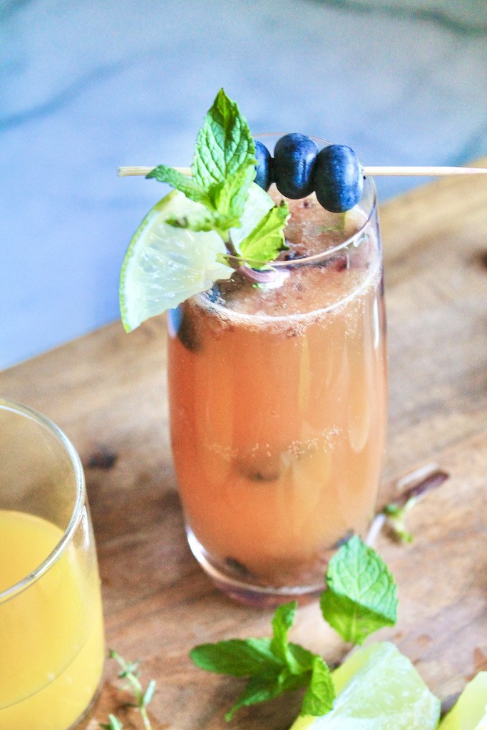 refreshing mango blueberry gin fizz