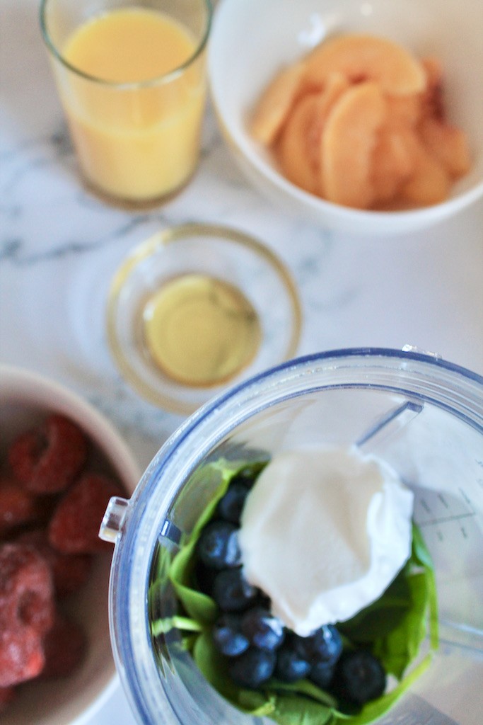 blend spinach, berries, yogurt, and honey
