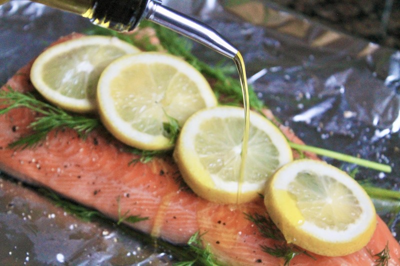 drizzle salmon with olive oil