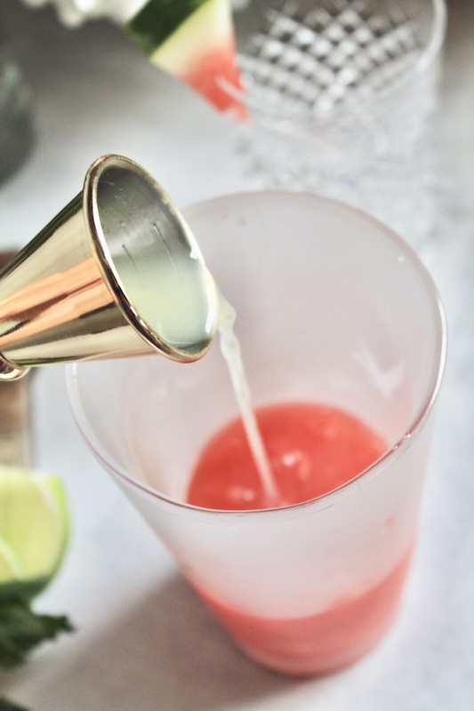 add lime juice to watermelon smash cocktail