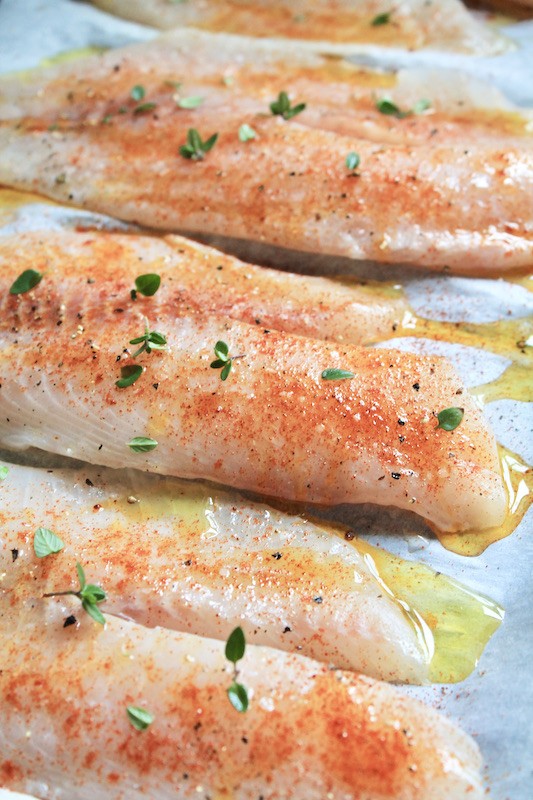 season tilapia fillets