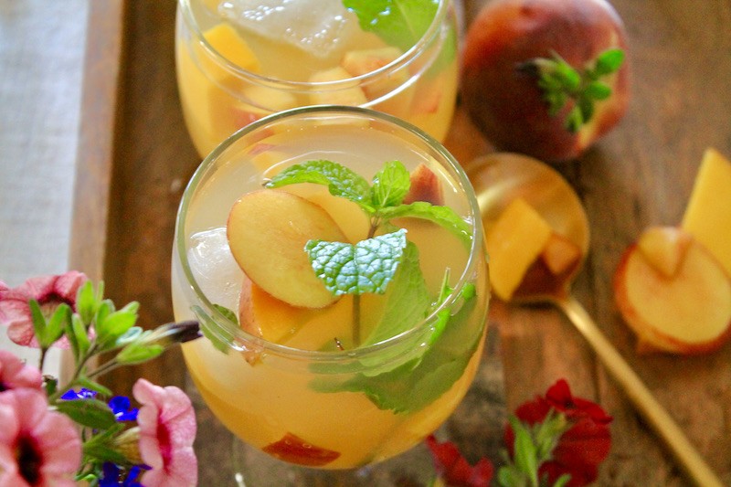 mango mint peach sangria with mint and vodka