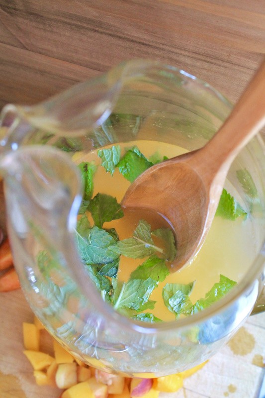 add fresh fruit and mint to pitcher sangria