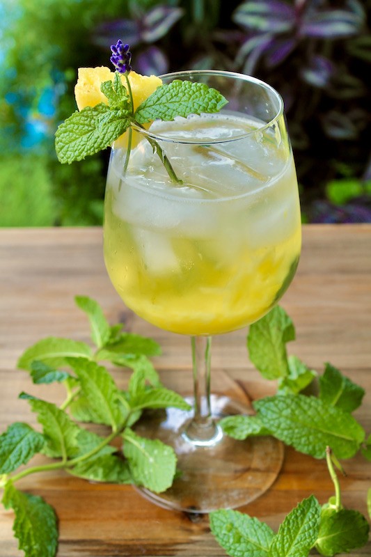 easy white wine spritzer cocktail with pineapple and mint