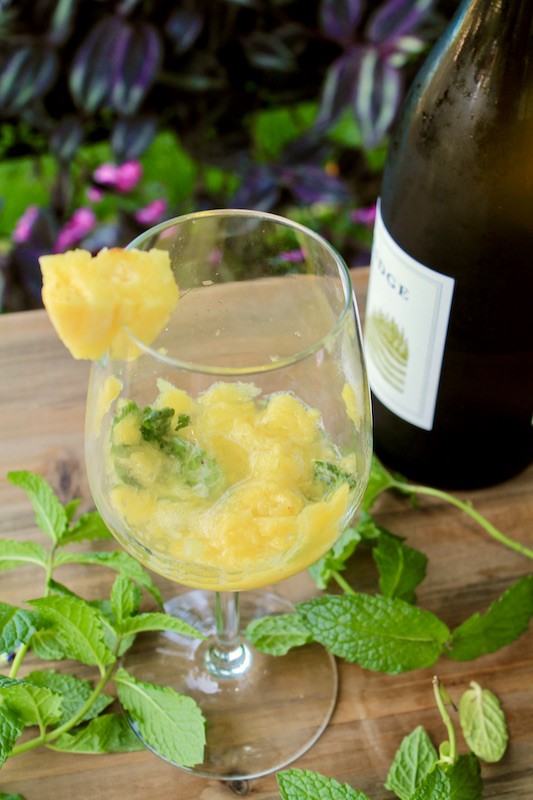 muddle pineapple and mint in glass