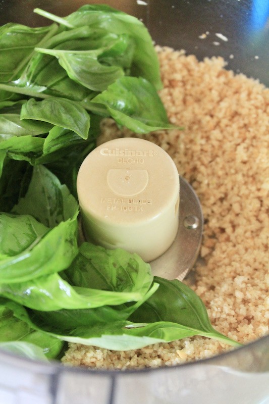 add fresh basil and olive oil and pulse in the food processor