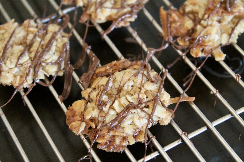 drizzle crispy oatmeal thin cookies with chocolate