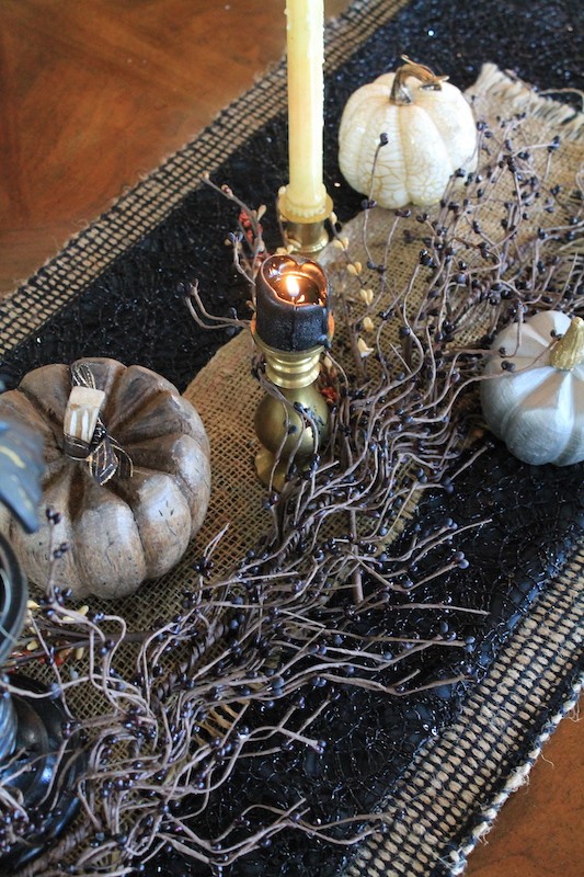 tapers and table runner for a halloween table decor