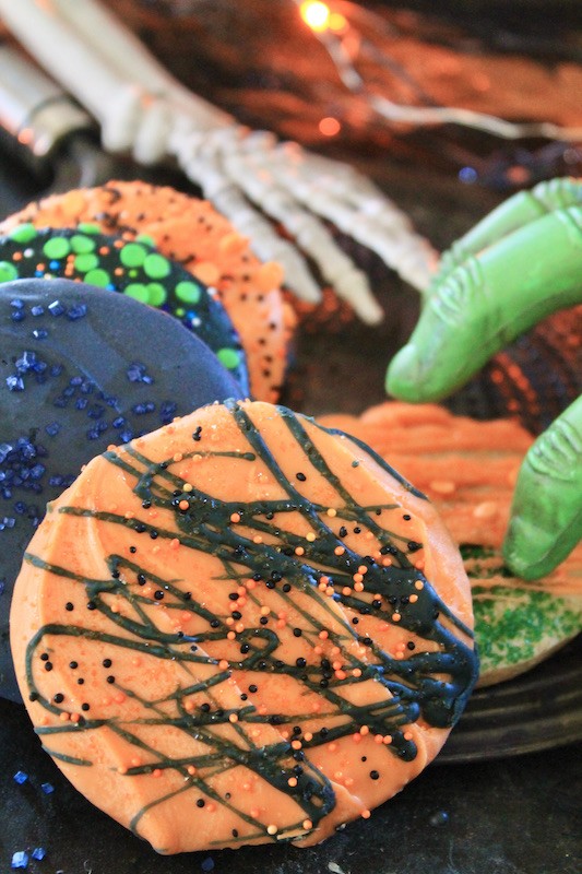 decorating spooky spiced Halloween cookies