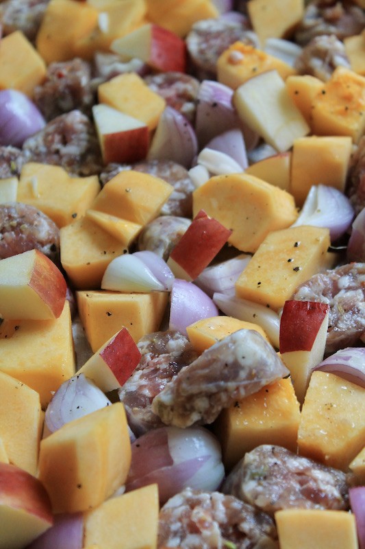 season shallot apples and squash and sausage with olive oil salt and pepper