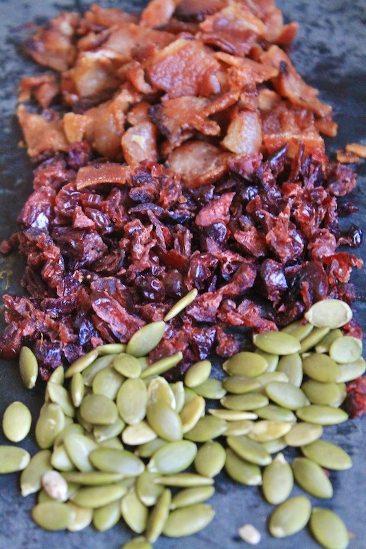 roasted sheet pan veggies toppings with cranberries pepitas and bacon