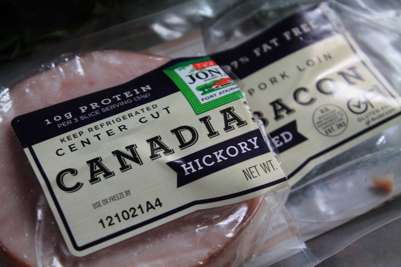 smoky Canadian bacon diced for a spicy power green salad
