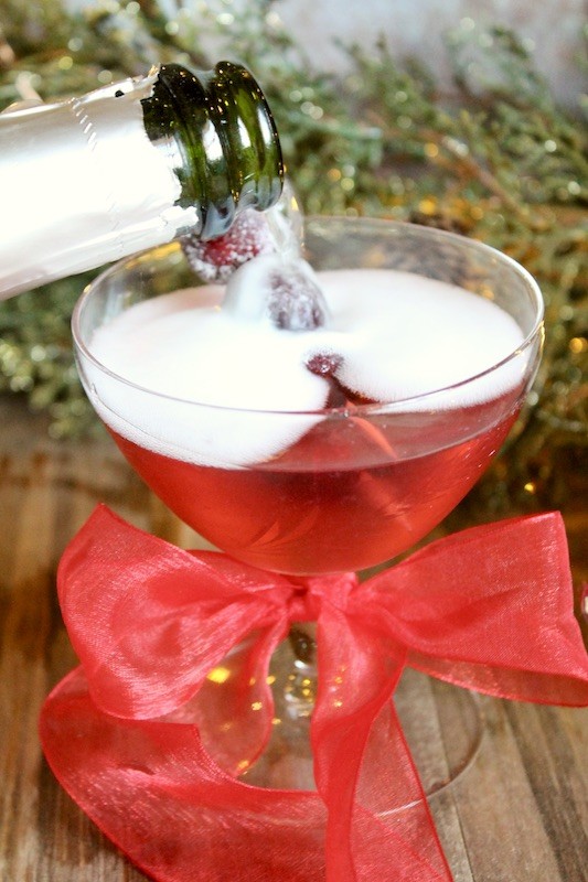 shake and strain then top off in a martini glass or coupe with champagne Prosecco or cava