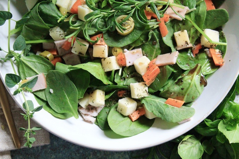 spicy giardiniera power green salad with balsamic dressing