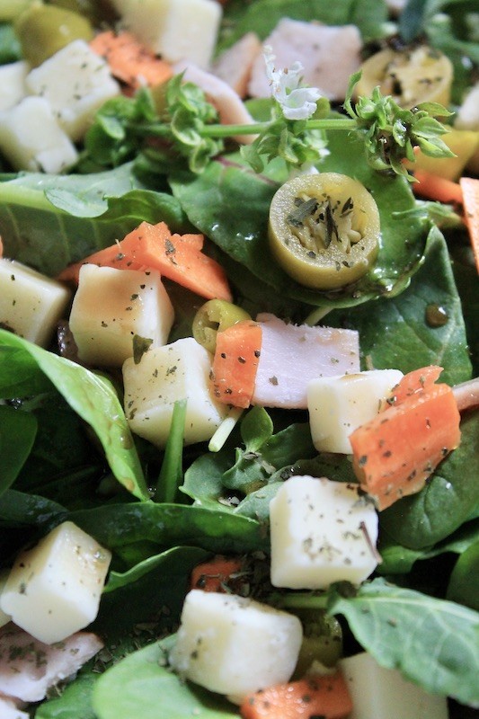 spicy power green salad with balsamic dressing
