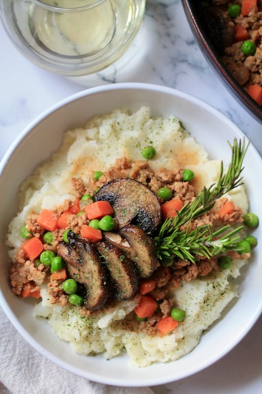 serve meat over potatoes with bread