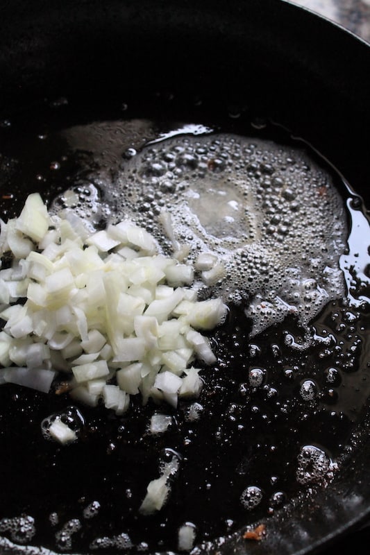 diced onion and garlic in the pan butter