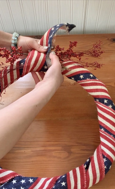 seal the open flower space by wrapping the end of the ribbon over and adding glue to the back