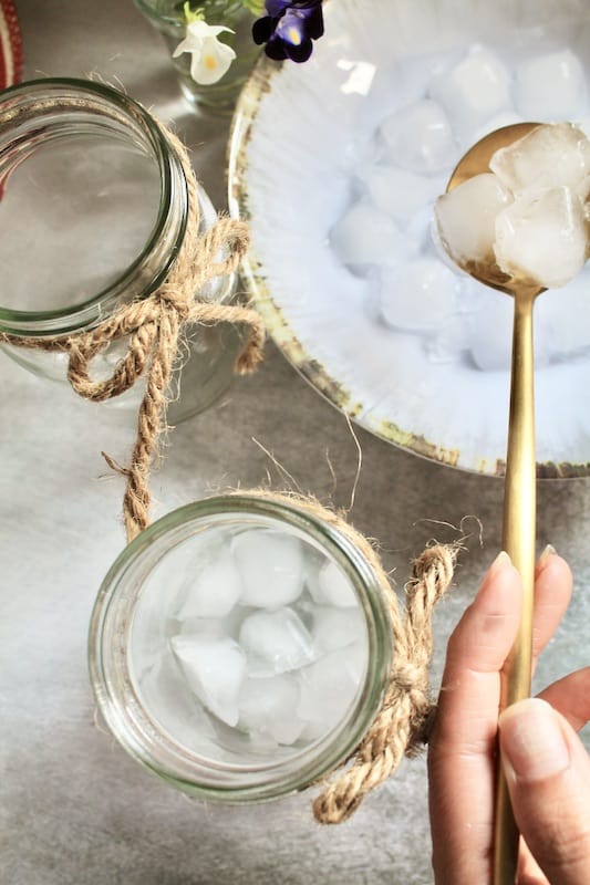add ice to a mason jar glass