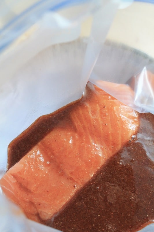 mix together marinade and pour over fish in ziplock bag