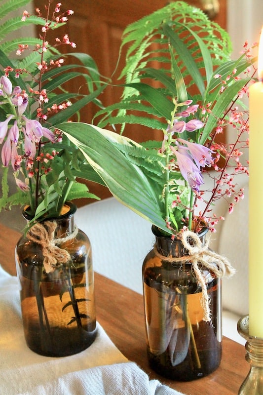 vintage medicine bottle tropical flower arrangements