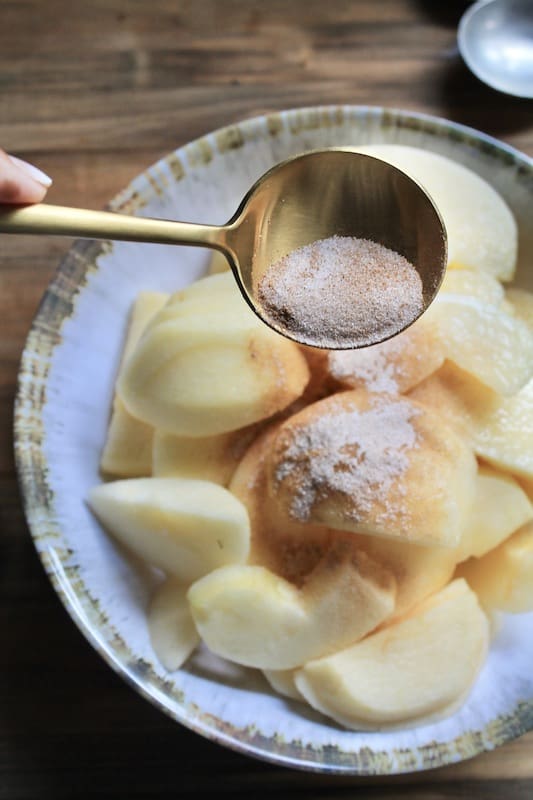 sliced apples with cinnamon sugar and lemon juice