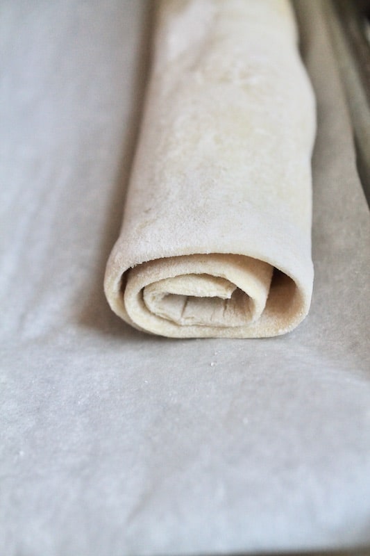 roll the puff pastry into a jelly roll and slice