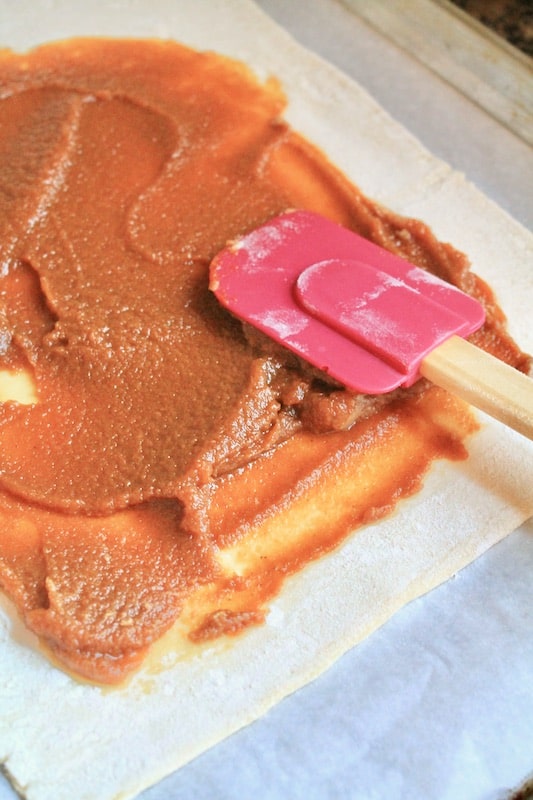 spread the pumpkin on the puff pastry sheet