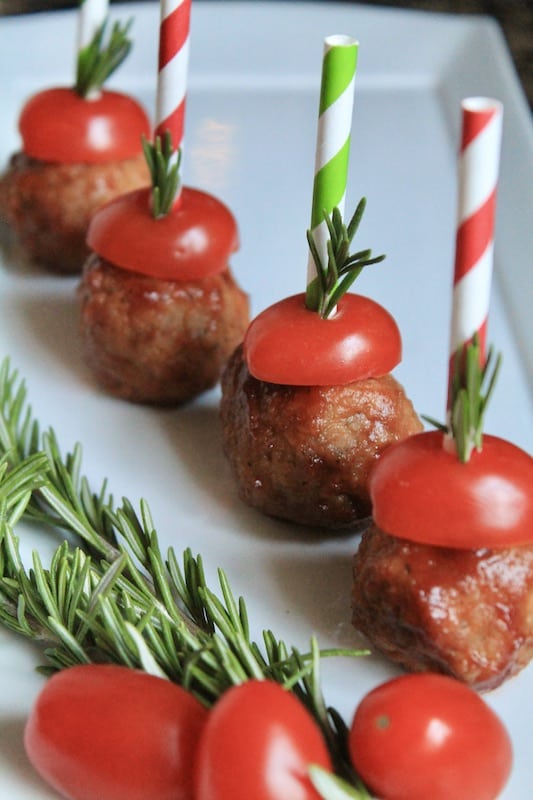 serve cocktail meatballs with tomato and rosemary 