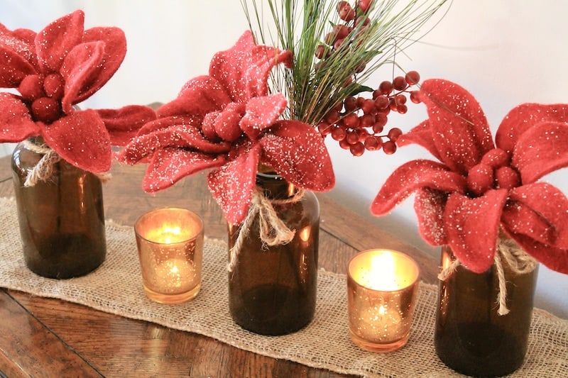 easy poinsettia brown glass bottles centerpiece