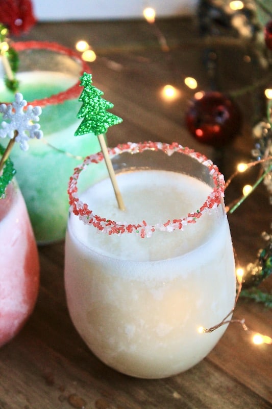 festive christmas tree drink stirrer with pina coladas
