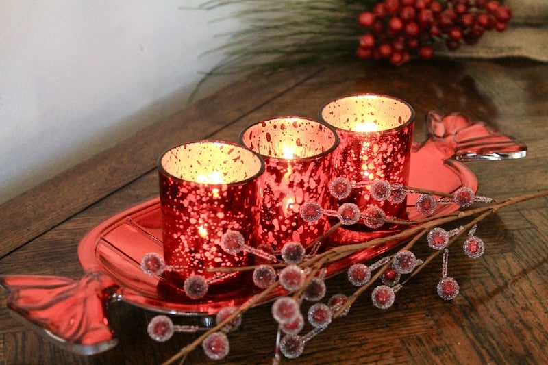 red votives and berries christmas table centerpiece