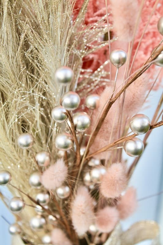 gold winterberries for a new years eve decor vase centerpiece