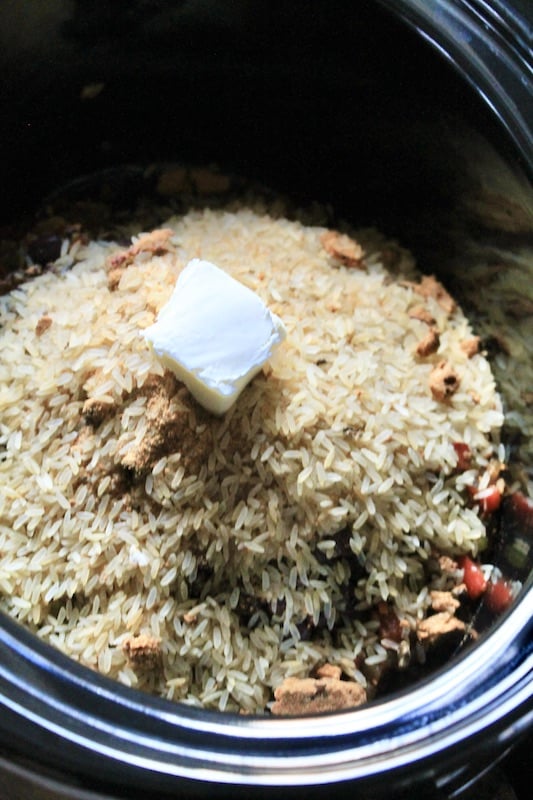 stir in butter for easy sausage jambalaya crockpot rice recipe