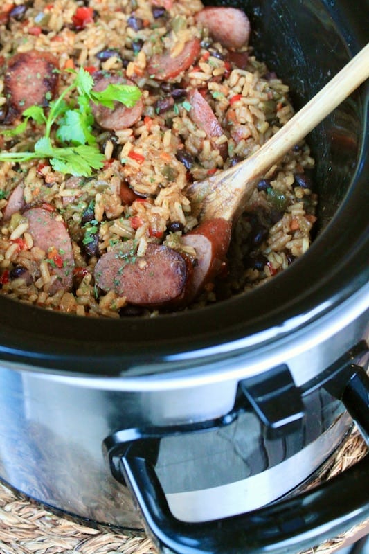 stir in browned sausage slices in slow cooker and heat through in crockpot to finish the easy jambalaya with sausage in crockpot