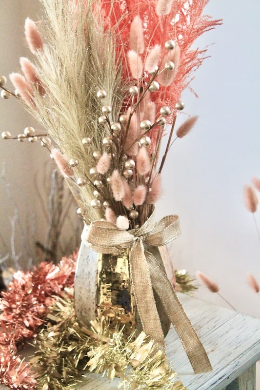 pink and gold pampas grass new years eve centerpiece idea
