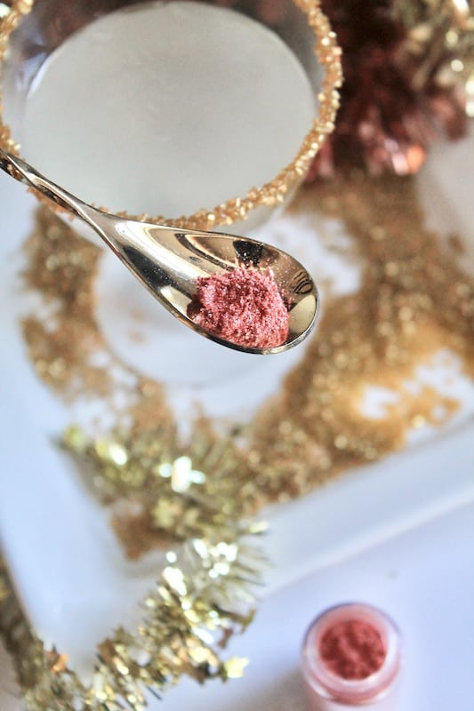 add pink or rose gold edible glitter to cocktail to turn it pink
