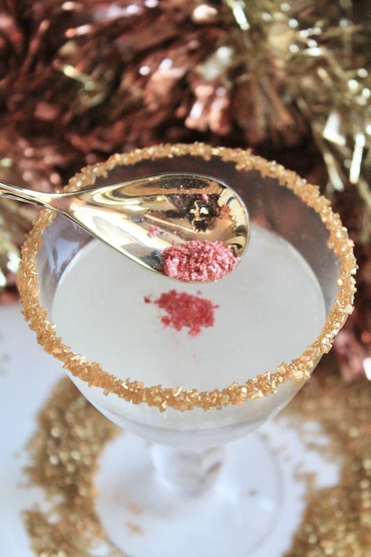 add edible glitter dust to glass