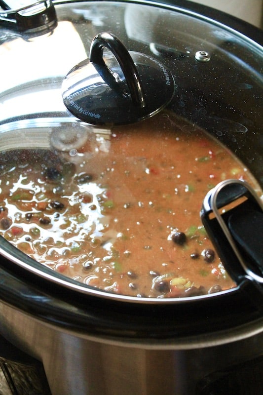 add bay leaves and cover to cook for 2 and a a half hours in crockpot for easy jambalaya