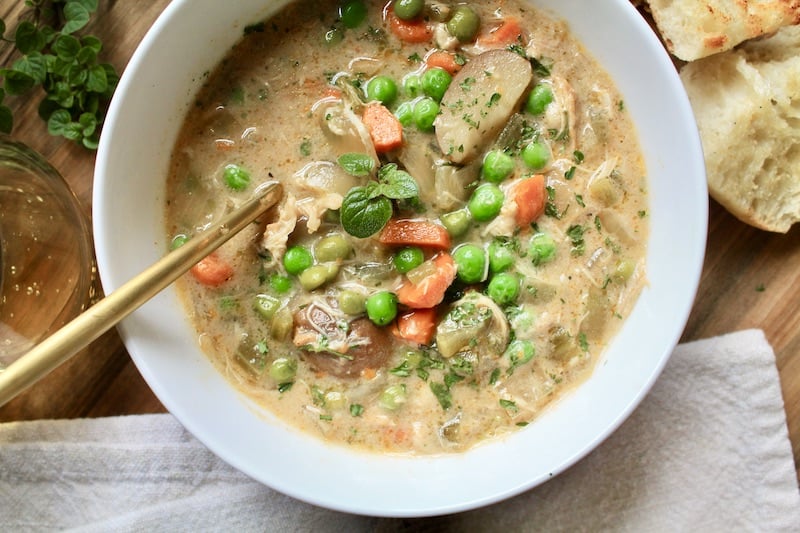 stir together, let thicken, then add chicken pieces back in as well as frozen peas.  Serve hot with parsley and crusty butter bread