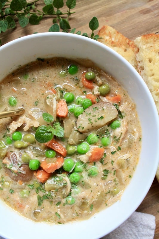 break apart chicken into bite sized pieces to add back in the pot later