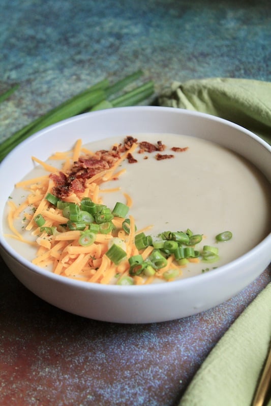 peel potatoes and add to slow cooker or crock pot