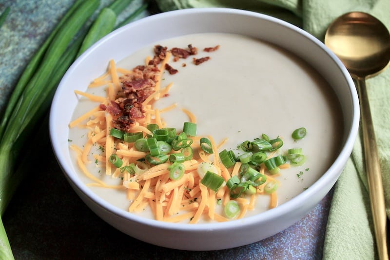 separate some of the soup and stir in a little cream and whisk together then add back into the crock pot
