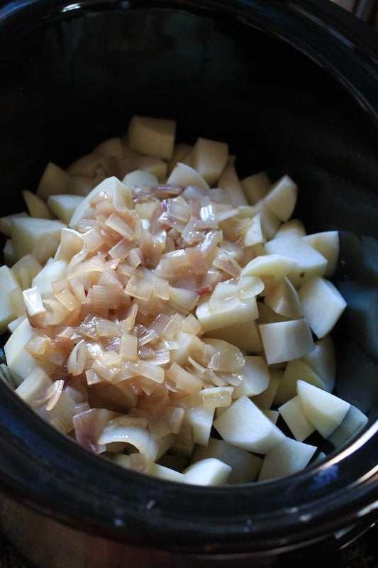 add shallots to crock pot over cubed potatoes