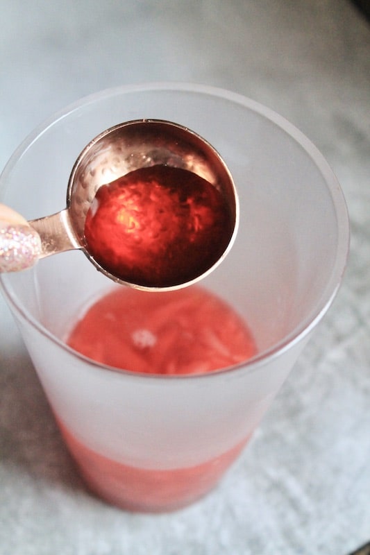 add cherry syrup, lemon, and rum