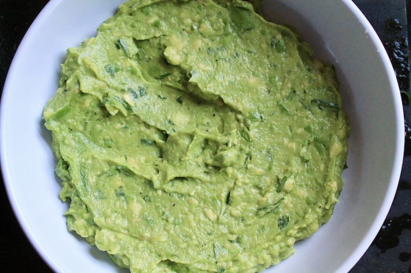 serve guacamole in a serving bowl and flatten a bit with spatula